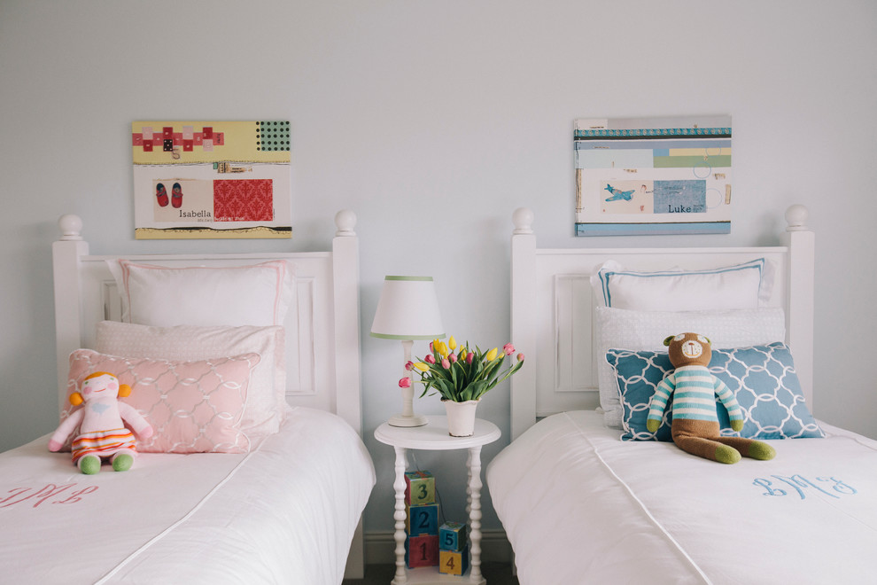 Traditional gender-neutral kids' bedroom in Chicago with white walls and carpet.