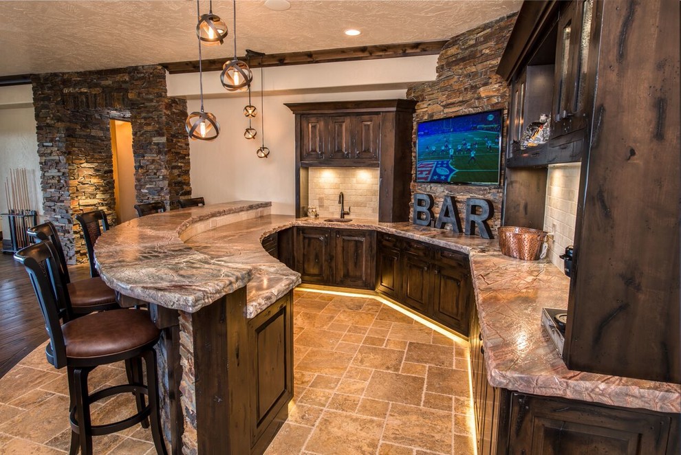 Inspiration for a large country home bar in Seattle with beige splashback and travertine splashback.