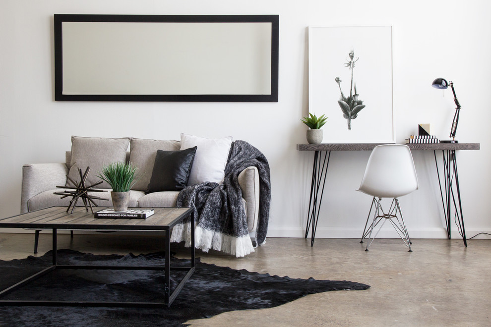 Design ideas for a scandinavian living room in Sydney with white walls, concrete floors and beige floor.