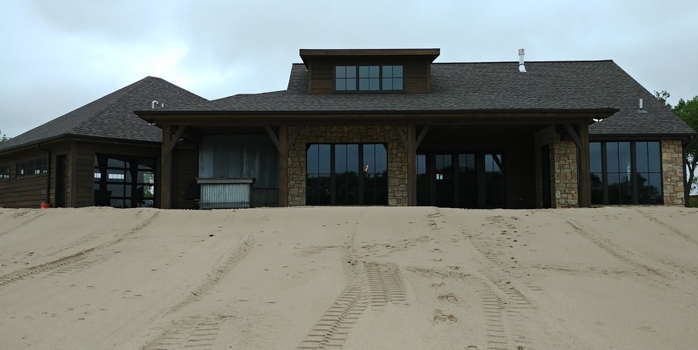 Mountain style home design photo in Omaha
