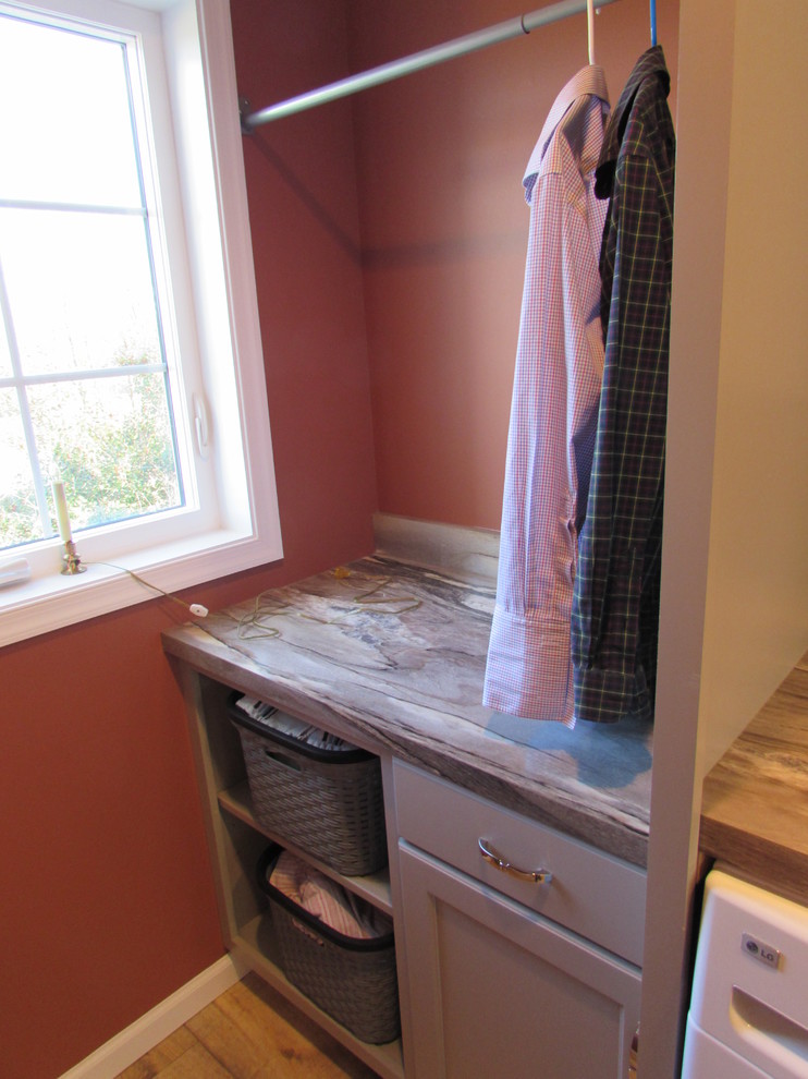 Dedicated laundry room - small transitional single-wall dedicated laundry room idea with a drop-in sink, recessed-panel cabinets, gray cabinets, laminate countertops and a side-by-side washer/dryer