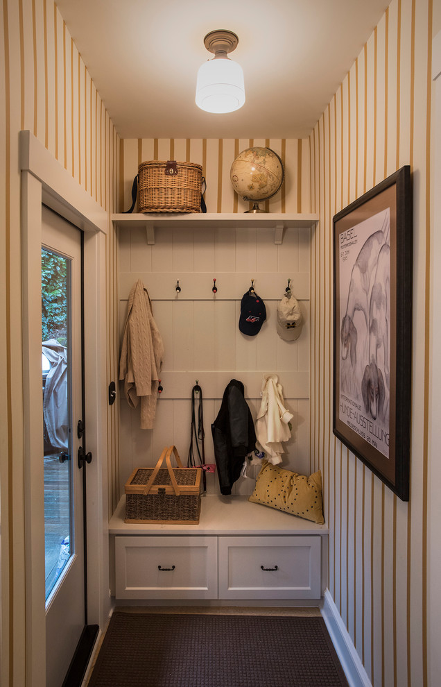 Inspiration for a small traditional mudroom in Portland with multi-coloured walls, a single front door and a glass front door.