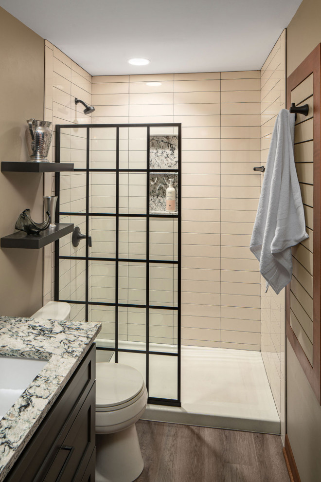 Small trendy beige tile and ceramic tile vinyl floor, gray floor and single-sink alcove shower photo in Columbus with flat-panel cabinets, dark wood cabinets, a two-piece toilet, beige walls, an undermount sink, quartz countertops, multicolored countertops and a built-in vanity