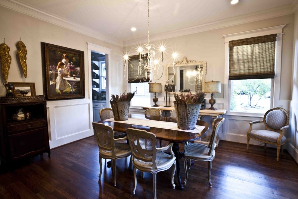 Inspiration for a mid-sized traditional separate dining room in Houston with beige walls and dark hardwood floors.