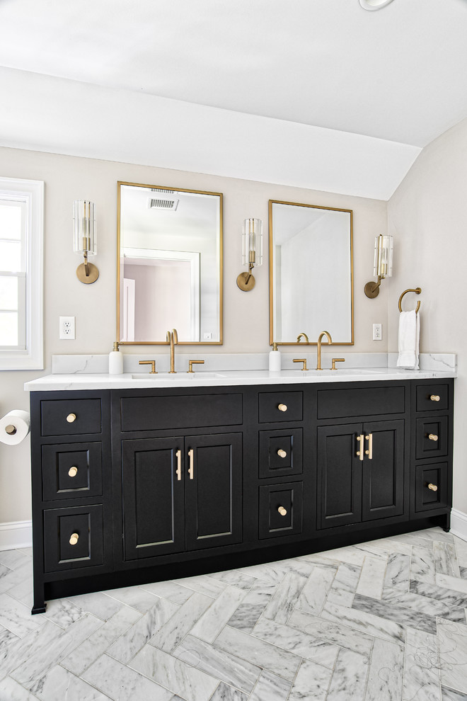 This is an example of a large transitional master bathroom in New York with black cabinets, an alcove shower, marble, marble floors, an undermount sink, engineered quartz benchtops, white floor, a hinged shower door, white benchtops and shaker cabinets.