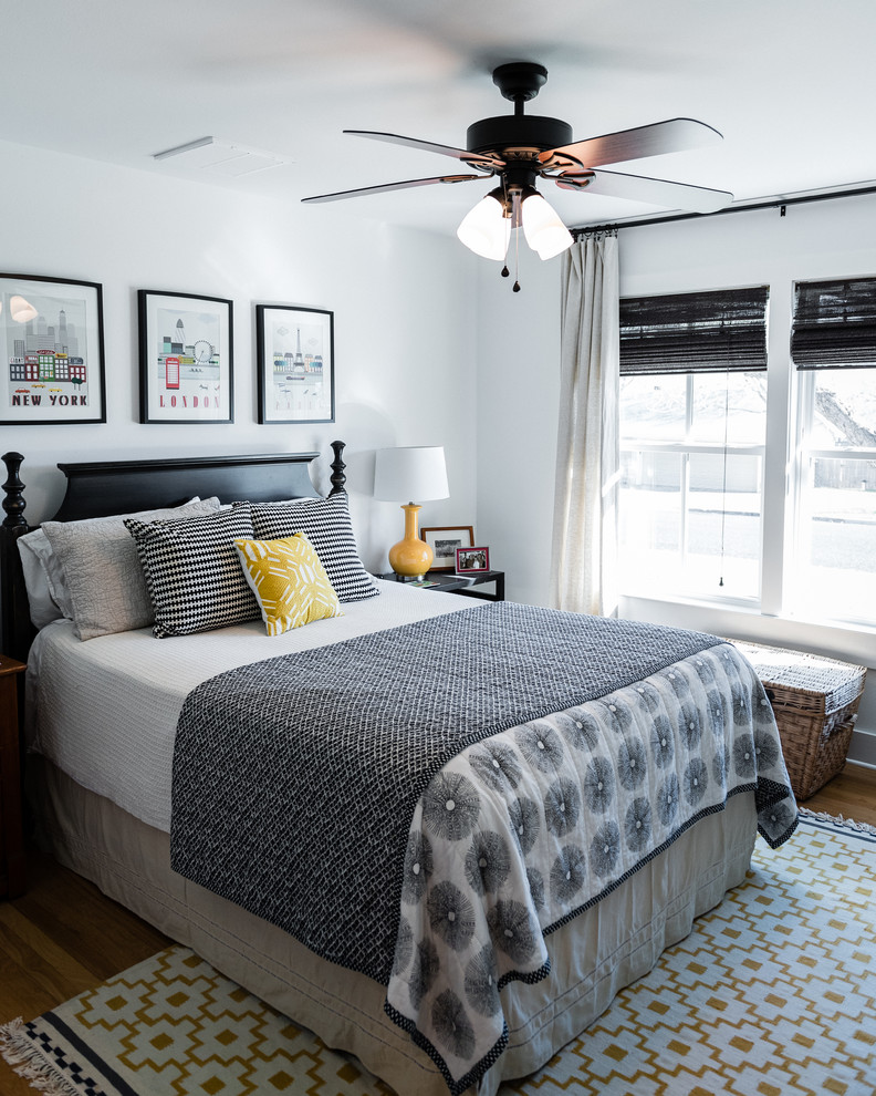 Inspiration for a large transitional guest carpeted bedroom remodel in Austin with white walls and no fireplace