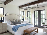 Farmhouse Bedroom by Meriwether Design Group