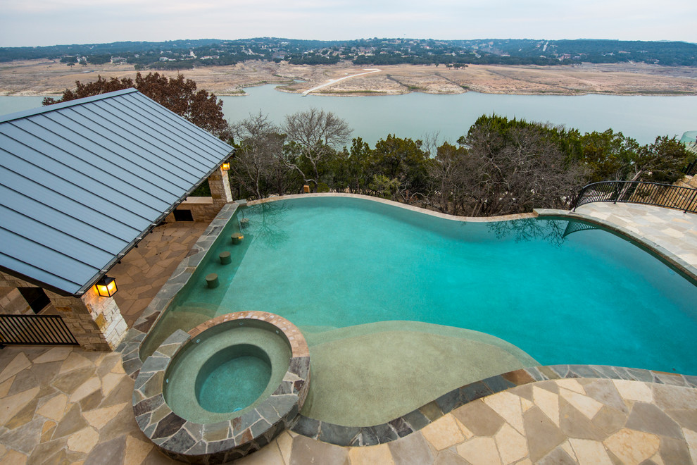 Inspiration for a rustic pool remodel in Austin