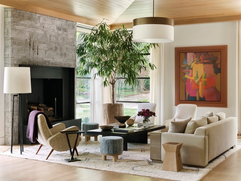 Inspiration for a contemporary formal and open concept medium tone wood floor, brown floor, vaulted ceiling and wood ceiling living room remodel in Dallas with white walls, a standard fireplace, a stone fireplace and no tv