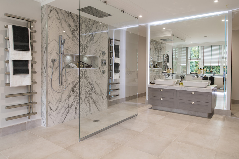 Photo of a contemporary bathroom in London with black and white tile, porcelain tile, porcelain floors and grey floor.