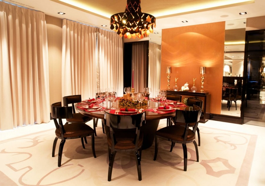 Photo of a large contemporary open plan dining in London with orange walls, porcelain floors and white floor.