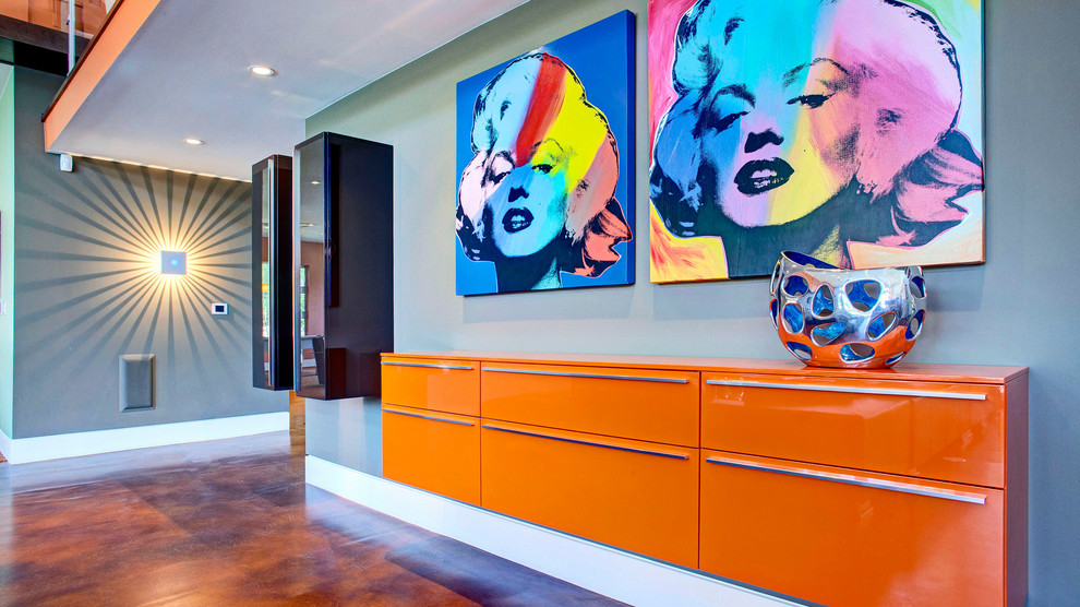 This is an example of a contemporary hallway in Orange County with blue walls and orange floor.
