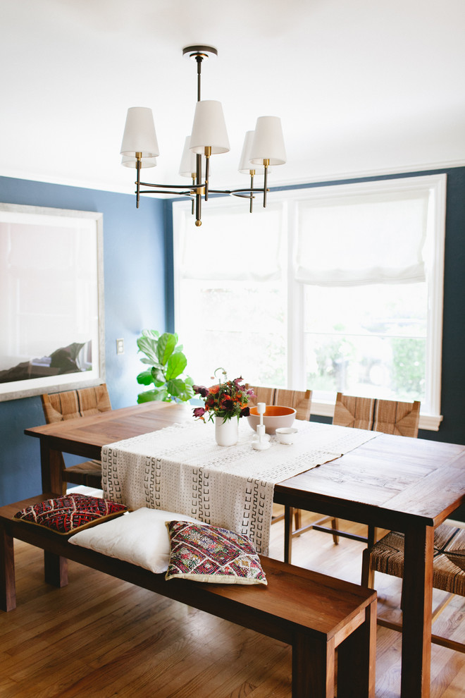 Mid-sized midcentury separate dining room in Seattle with blue walls and light hardwood floors.