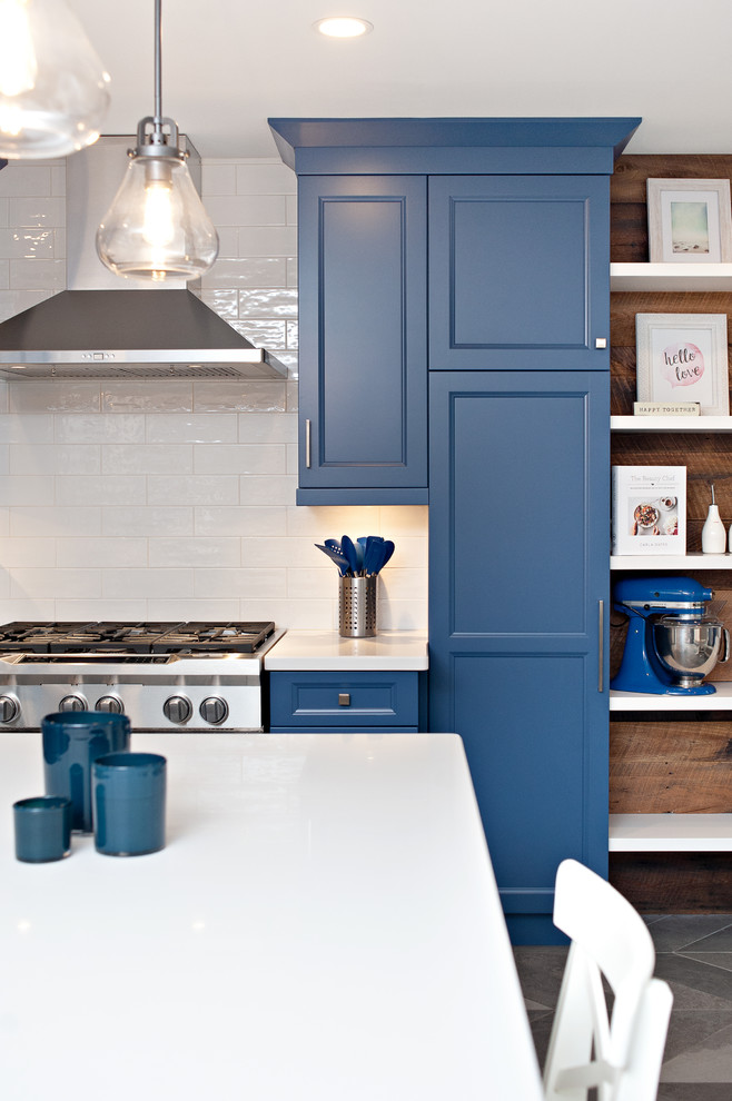 Example of a transitional kitchen design in Toronto