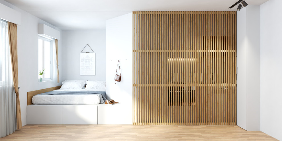 Kleines Skandinavisches Schlafzimmer im Loft-Style mit hellem Holzboden in Madrid