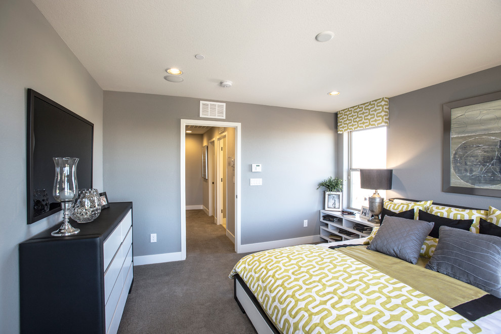 Photo of a mid-sized eclectic master bedroom in Las Vegas with grey walls and carpet.