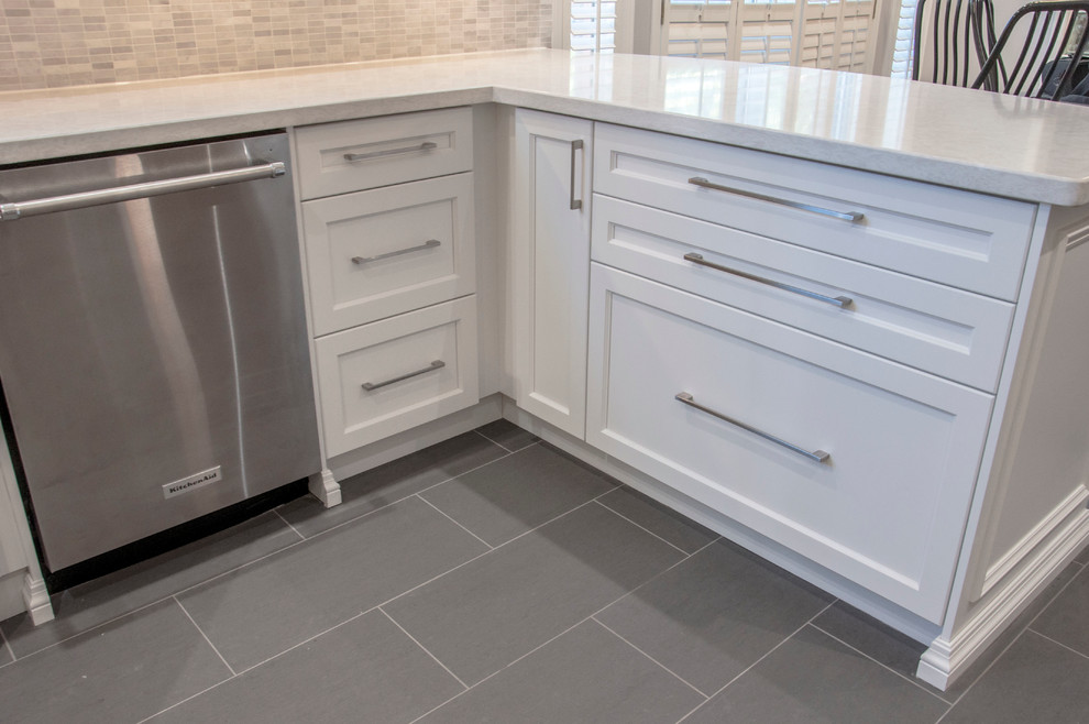 Example of a transitional kitchen design in Toronto