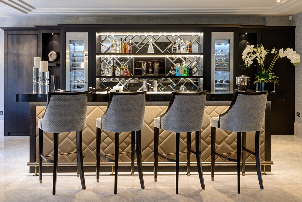 Photo of a large contemporary single-wall seated home bar in Surrey with open cabinets, wood benchtops, mirror splashback, grey floor and black benchtop.