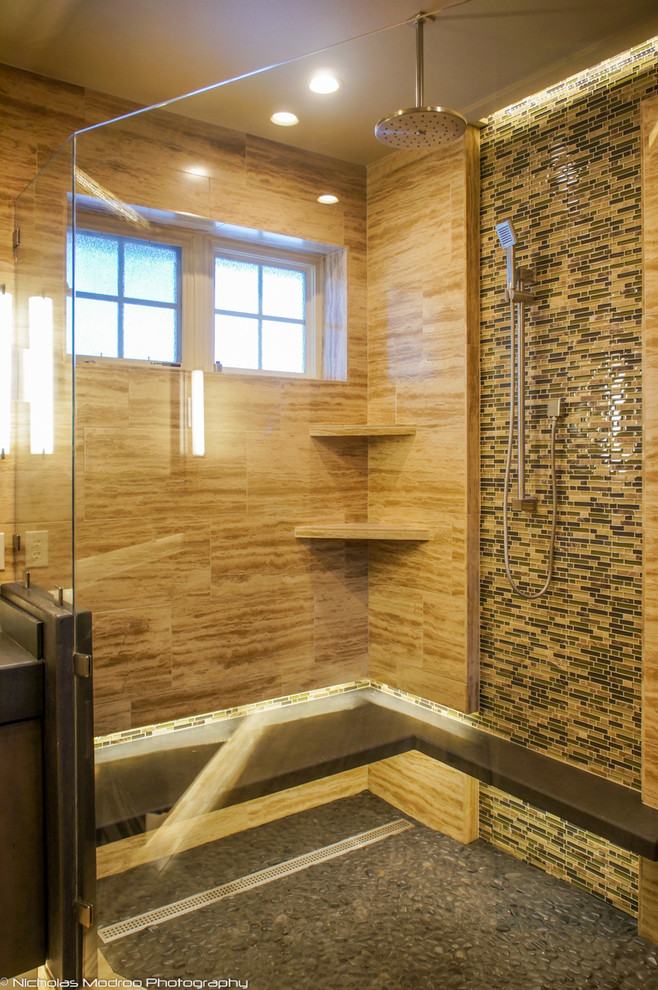 Trendy beige tile and stone tile corner shower photo in Denver with an integrated sink, flat-panel cabinets, dark wood cabinets, concrete countertops and a two-piece toilet