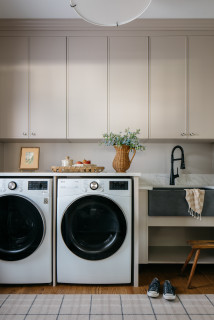 Hand Made Custom Laundry Chute And Hall Storage Unit by Built