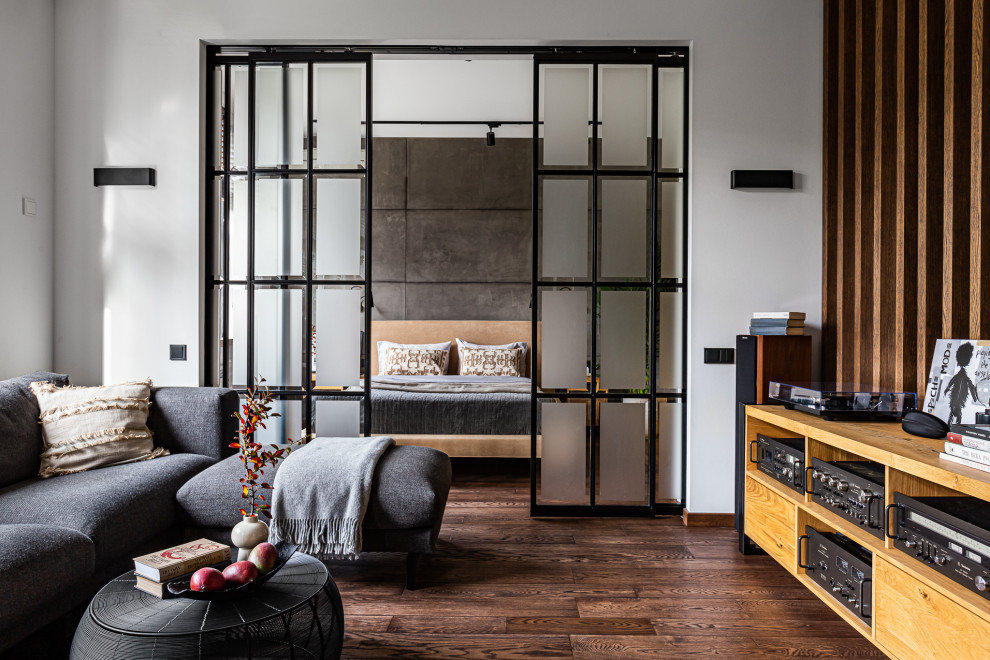 This is an example of a medium sized urban grey and white open plan living room in Saint Petersburg with a reading nook, grey walls, vinyl flooring, a built-in media unit, brown floors and a wood ceiling.