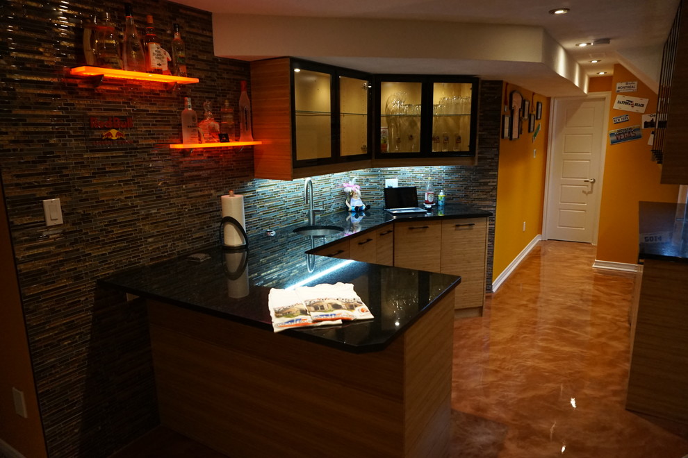 Photo of a large modern galley seated home bar in Toronto with an undermount sink, flat-panel cabinets, light wood cabinets, quartz benchtops, multi-coloured splashback, matchstick tile splashback and orange floor.