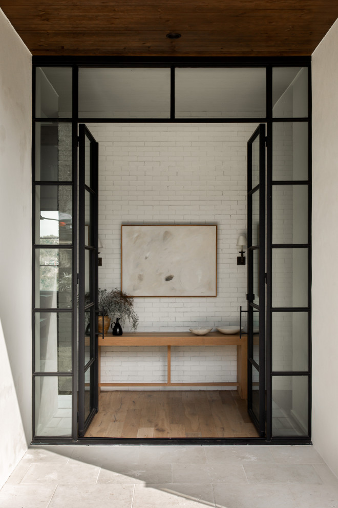 Inspiration for a transitional entryway remodel in Austin