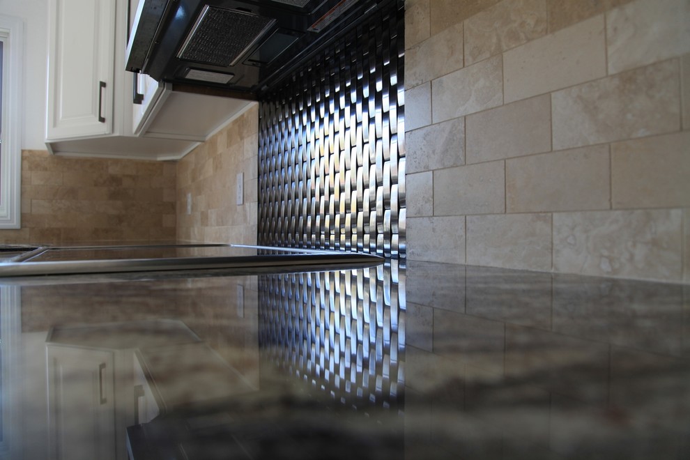 Example of a transitional kitchen design in Chicago with beige backsplash, cement tile backsplash and stainless steel appliances