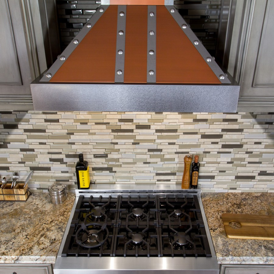 Kitchens featuring a ZLINE Copper Wall Range Hood