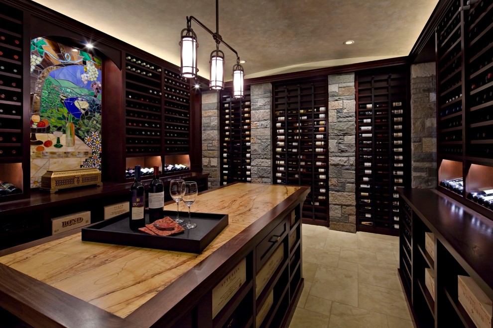 This is an example of a contemporary wine cellar in Seattle with display racks and beige floor.