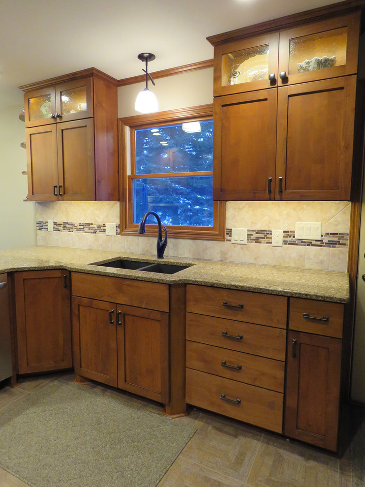 Example of a mid-sized transitional u-shaped vinyl floor open concept kitchen design with a double-bowl sink, shaker cabinets, dark wood cabinets, quartz countertops, beige backsplash, cement tile backsplash, stainless steel appliances and a peninsula