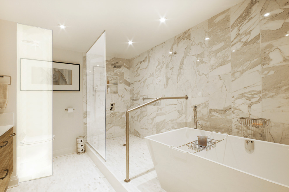 Inspiration for a large contemporary white tile and stone tile mosaic tile floor freestanding bathtub remodel in Toronto with an undermount sink, flat-panel cabinets, medium tone wood cabinets, quartz countertops and white walls