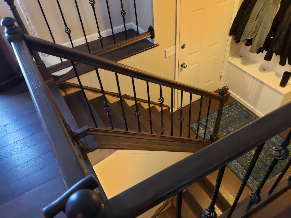 Classic Iron Balusters & Dark Wood Staircase Transformation
