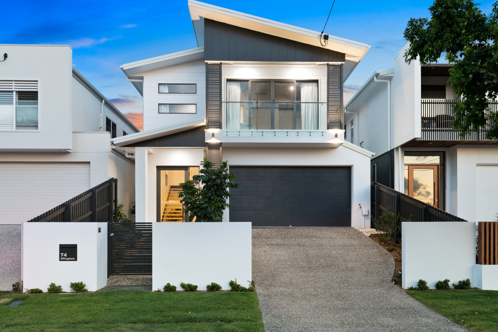Design ideas for a large contemporary two-storey white house exterior in Brisbane with concrete fiberboard siding, a butterfly roof and a metal roof.