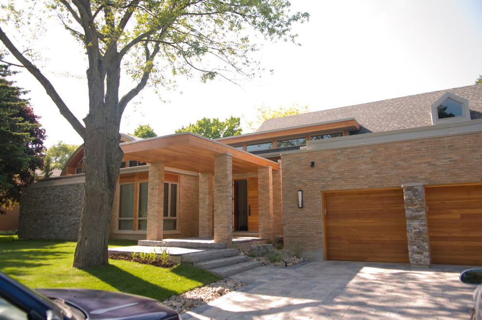 This is an example of a contemporary two-storey brick exterior in Toronto.