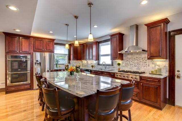 viscont white granite countertops with cherry cabinets