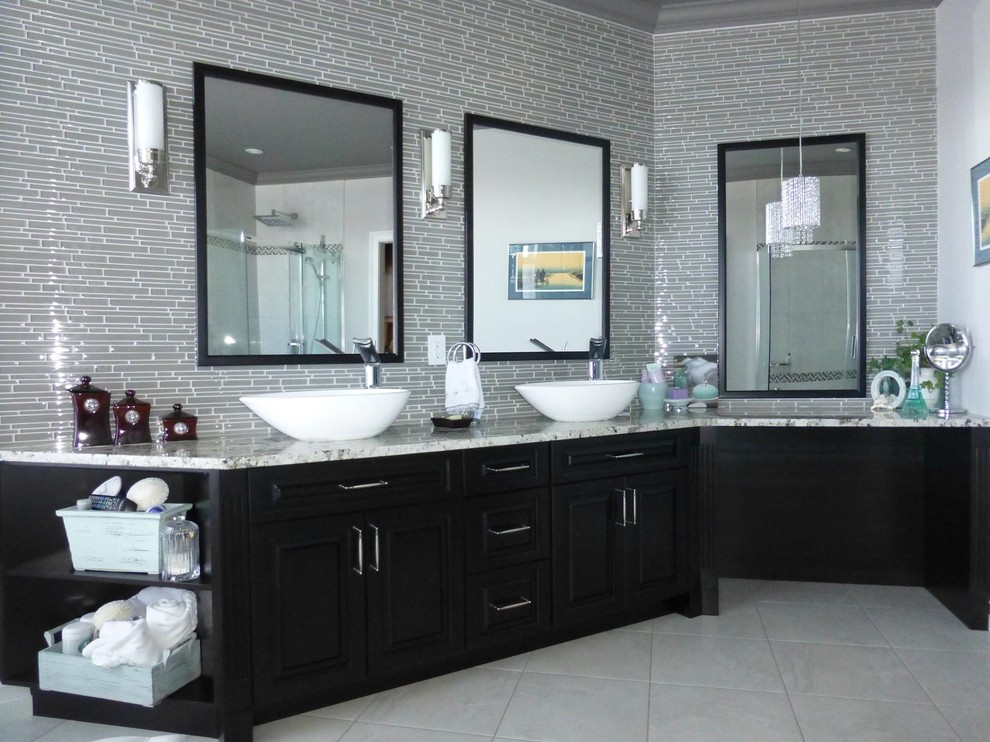 Inspiration for a large contemporary master bathroom in Toronto with raised-panel cabinets, black cabinets, gray tile, matchstick tile, grey walls, porcelain floors, a vessel sink, engineered quartz benchtops and beige floor.