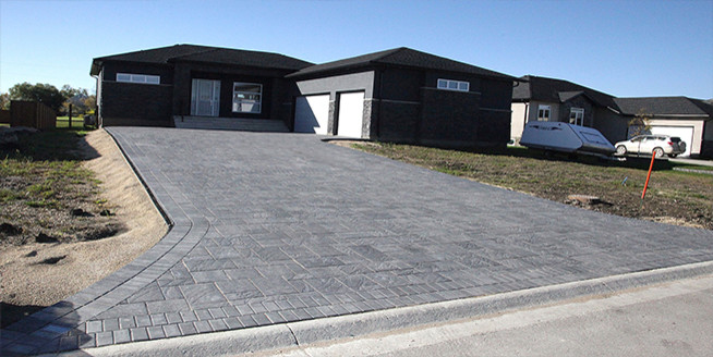 Design ideas for a huge modern front yard driveway.