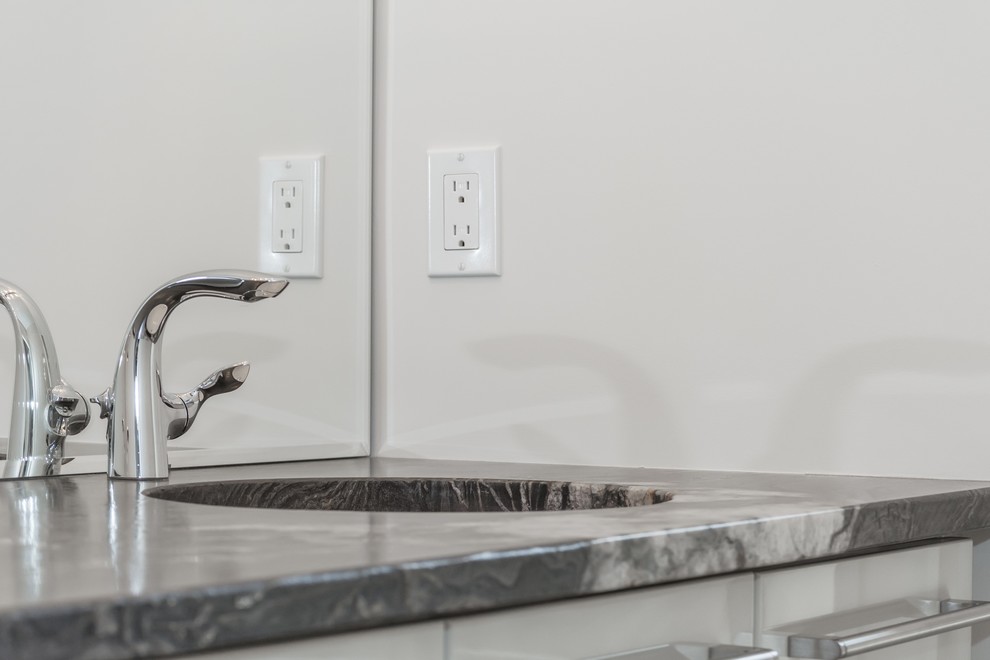 Freestanding bathtub - large transitional master gray tile and ceramic tile porcelain tile freestanding bathtub idea in Toronto with a vessel sink, white cabinets, quartz countertops and white walls