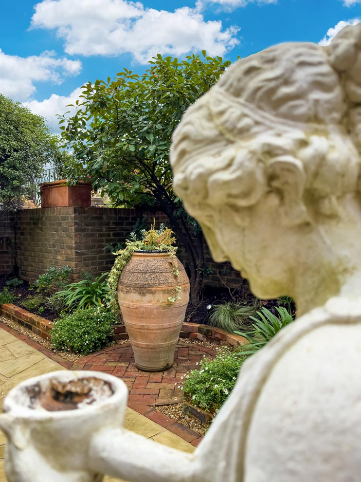 Beautiful Italian Garden statue and large olive jar. - Mediterranean ...