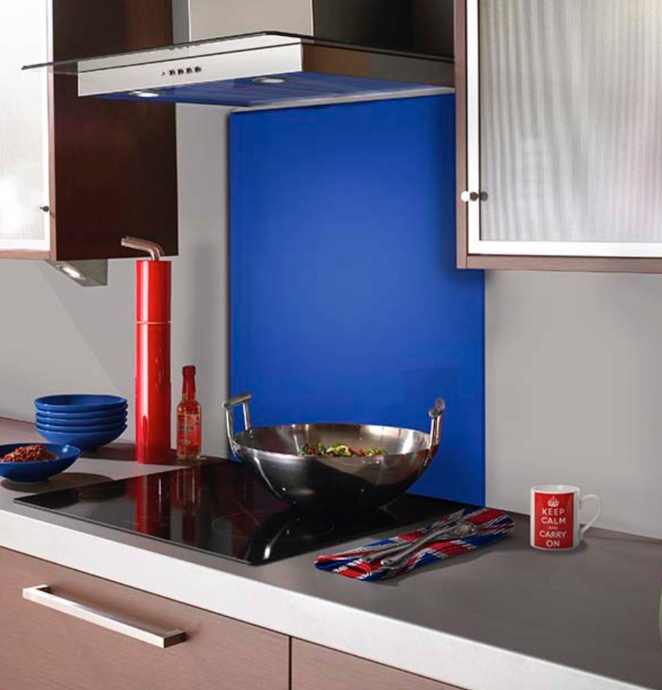 Inspiration for a contemporary kitchen in Hertfordshire with flat-panel cabinets, white cabinets, blue splashback and glass sheet splashback.