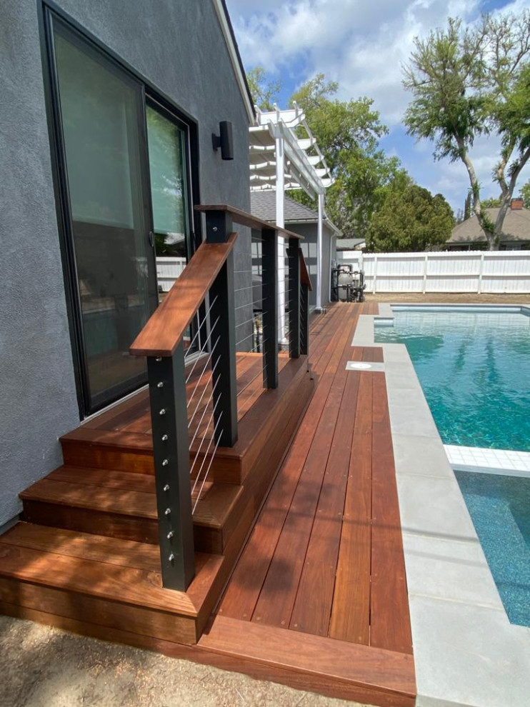 Photo of a large modern back full sun garden in San Francisco with decking.