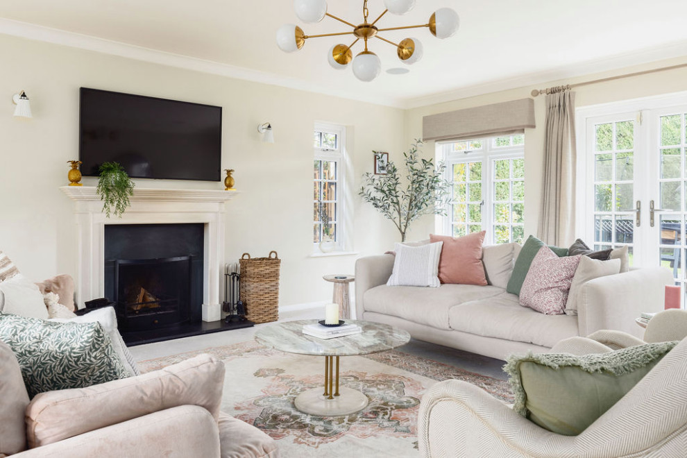 Large classic formal and cream and black open plan living room curtain in London with beige walls, a standard fireplace, a plastered fireplace surround, a wall mounted tv and beige floors.