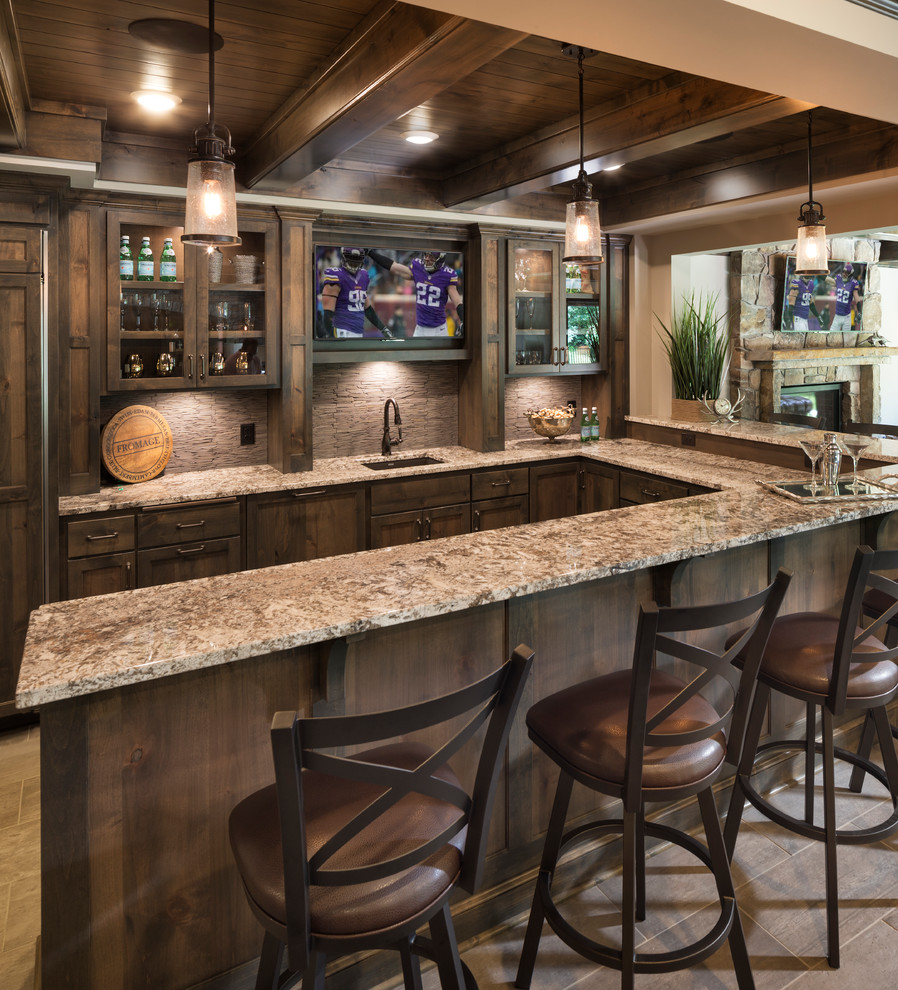 Example of a mountain style home bar design in Minneapolis