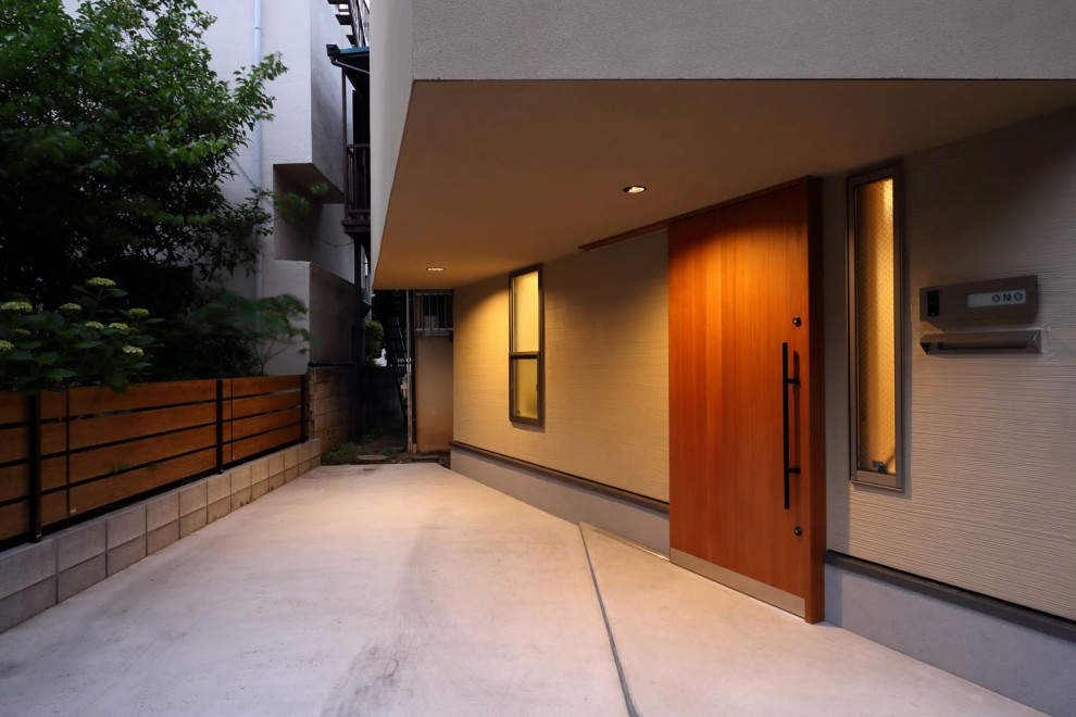 東京23区にある小さな和モダンなおしゃれな玄関の写真