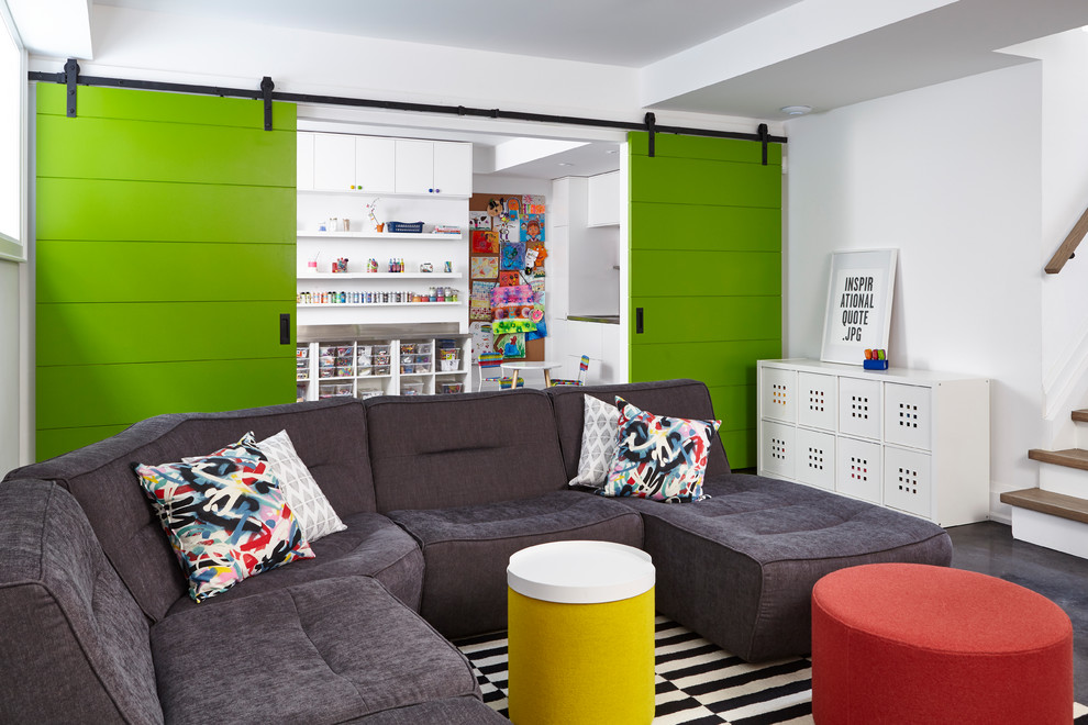 Contemporary gender-neutral kids' playroom in Toronto with white walls for kids 4-10 years old.