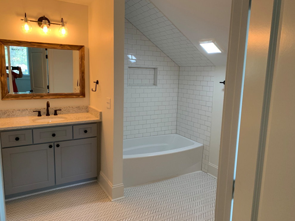 Inspiration for a transitional bathroom in Other with grey cabinets, an alcove tub, a shower/bathtub combo, white tile, subway tile, white walls, an undermount sink, white floor, a shower curtain, white benchtops, a single vanity and a built-in vanity.