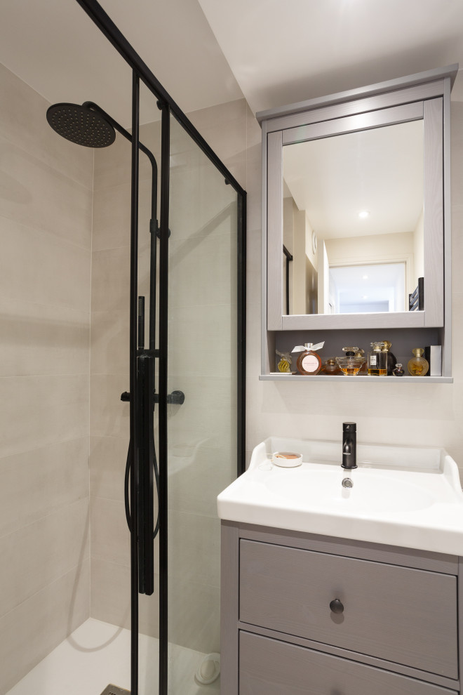 Inspiration for a small scandi shower room bathroom in Paris with a built-in shower, white tiles, ceramic tiles, white walls, a submerged sink, grey floors, a sliding door, white worktops, a single sink and a freestanding vanity unit.