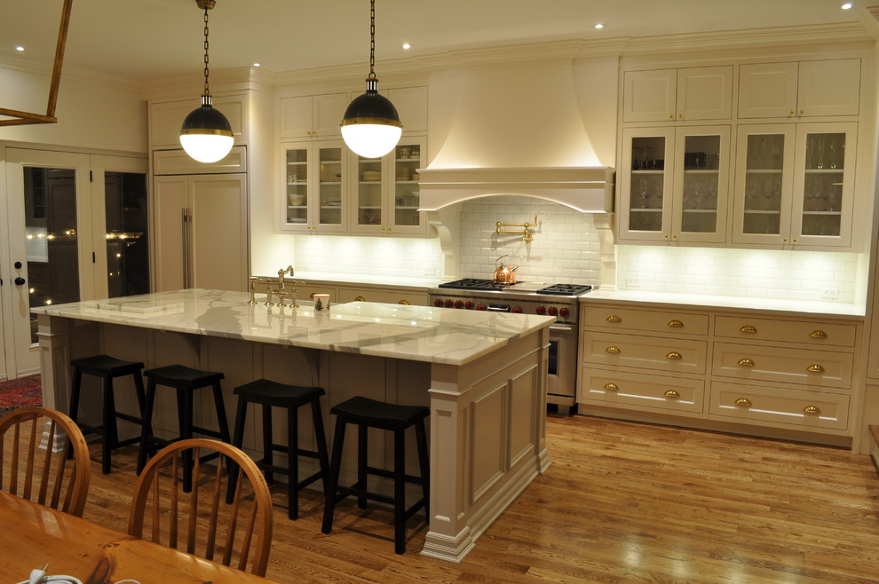 Example of a transitional kitchen design in Toronto