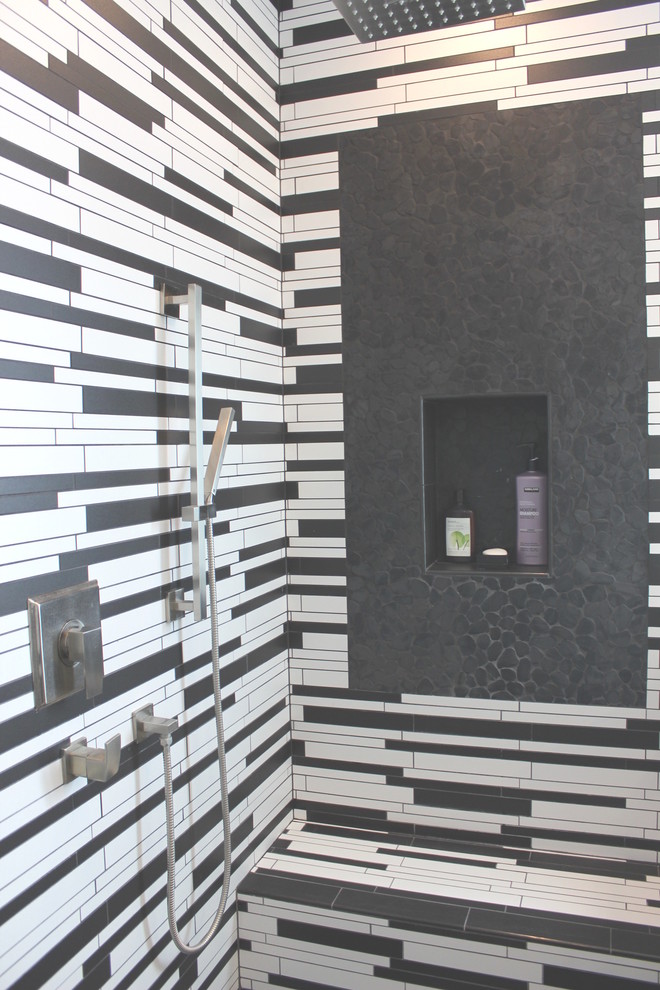 This is an example of a mid-sized contemporary master bathroom in Los Angeles with an alcove shower, black and white tile, matchstick tile and white walls.
